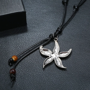 Vintage starfish necklace with bronze-tone alloy pendant and black braided wax cord