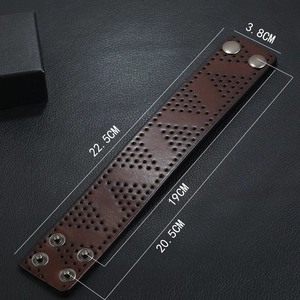 Detailed dimensions of wide brown leather bracelet with laser-cut triangular patterns