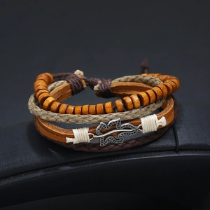 Retro multi-layer leather bracelet with wooden beads and a hollow leaf metal charm