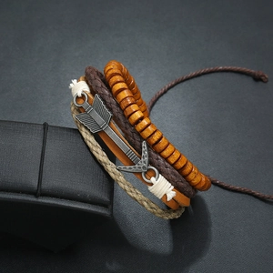 Men's retro layered leather bracelet set featuring bronze arrow charm and wooden beads
