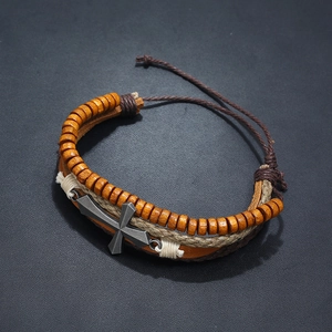 Retro multilayer leather bracelet with brown wooden beads and silver metal cross detail