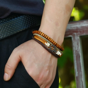 Men's retro layered braided leather bracelet with wood beads and metal leaf charm