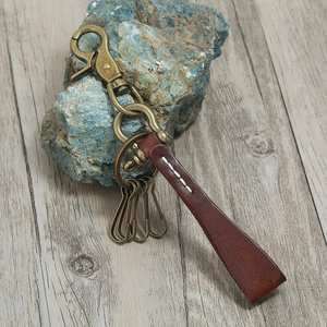 Vintage leather keychain with brass metal spring hook and three multi-functional rings