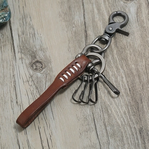 Vintage brown leather keychain with heavy duty metal swivel snap hook and three mini rings