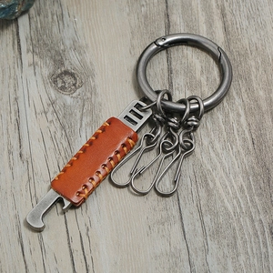Vintage brown leather and gunmetal keychain with integrated bottle opener and 3 hooks