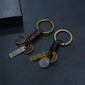 Retro braided leather keychain with bronze charms in black and brown finishes