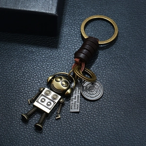 Vintage punk handmade woven robot keychain with bronze metal pendants on black leather