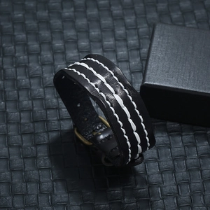 Men's retro black leather bracelet with white stitching and vintage gold buckle hardware