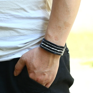 Vintage black leather wide cuff bracelet for men with white triple-row contrast stitching