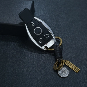 Woven leather keychain with silver frame car key case and vintage engraved metal tag