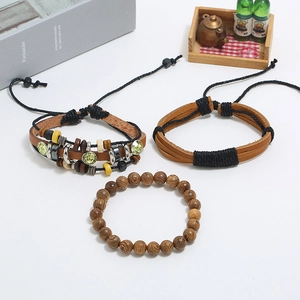 Three-piece punk vintage woven leather bracelet set with wooden beads and ethnic charms