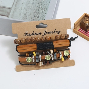 Bohemian four-piece men's leather and wood bead bracelet set with green rhinestone accent