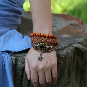 Multilayer bohemian leather bracelet set with wooden beads and a vintage star charm