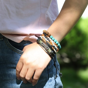 Stackable bohemian men's bracelet set with leather, wood beads, and turquoise accents