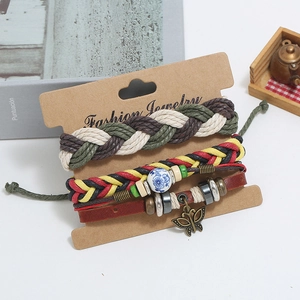 Three-piece bohemian braided leather bracelet set with ceramic beads and butterfly charm