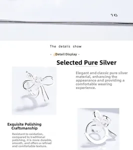 Détail macro de boucles d'oreilles nœud en argent 925 avec finition polie et zircon