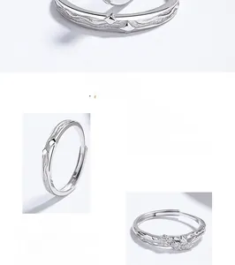 Detailed view of polished 925 sterling silver rings with adjustable open band design