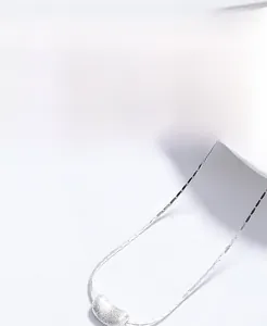 Detailed view of brushed S925 silver pea pendant with delicate matte texture finish