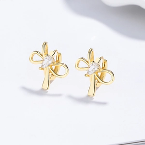 Élégantes boucles d'oreilles nœud en argent 925 avec zircon poire scintillant
