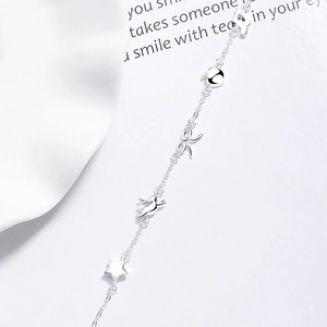 Bracelet en argent 925 avec breloques étoile, nœud et note de musique sur chaîne