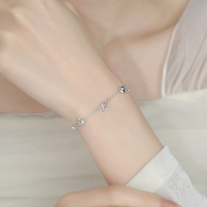 Bracelet élégant en argent sterling 925 avec charms nœud et étoile pour femme