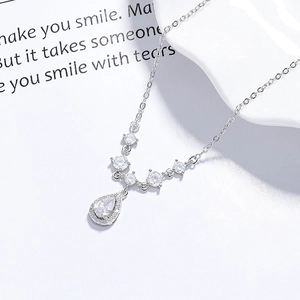 Elegant 925 silver teardrop pendant necklace with pear-cut zircon and accent stones