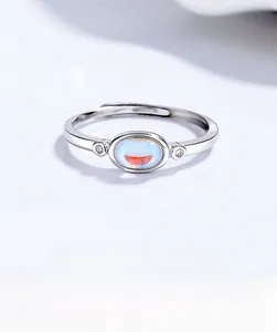 Detailed view of adjustable 925 silver ring featuring oval moonstone and zircons