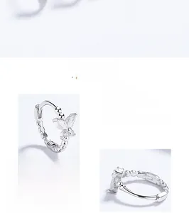 Dettaglio dell'orecchino a farfalla in argento sterling S925 lucido con zirconi marquise