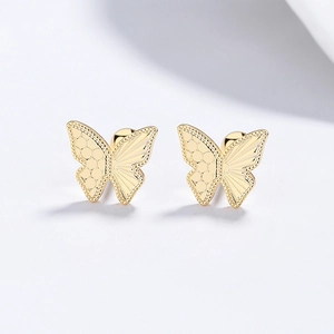Golden butterfly stud earrings with asymmetric textured wings and screw ball backs