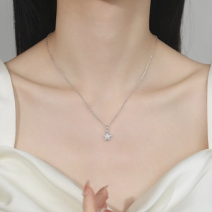 925 silver flower pendant necklace with marquise zircon on a model's neck