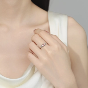 Minimalist 925 silver moonstone ring with pink oval gemstone and side zircons on finger