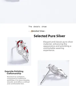 Detailed view of S925 silver koi fish earrings with red enamel and zircon accents