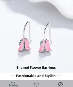 Detail of pink tulip drop earrings in 925 sterling silver with enamel flower petals