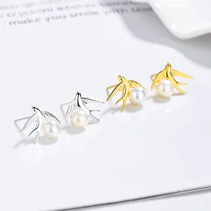 Elegant 925 sterling silver swallow bird stud earrings with white freshwater pearls