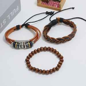 Three-piece retro woven leather bracelet set with wooden beads and metal charms