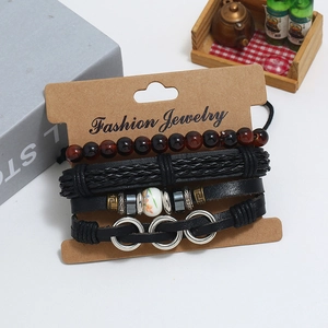 Four-piece set of woven leather bracelets with beads on a fashion jewelry display card