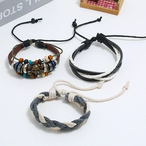 Set de 3 bracelets vintage en cuir avec breloque crâne et cordons tressés ajustables