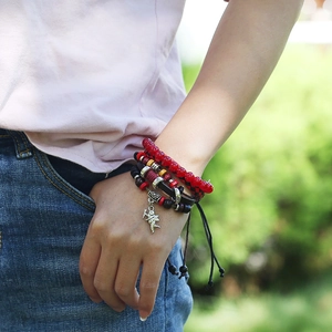 Multilayer beaded leather bracelet set with red beads and Cupid angel wing charm