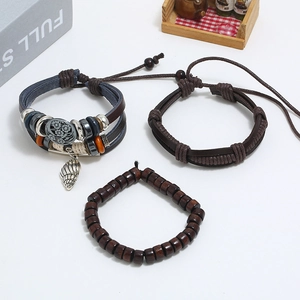 Three-piece men's leather bracelet set with wooden beads and vintage metal charms