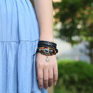 Bohemian multilayer braided leather bracelet set with colorful wooden beads and leaf pendant
