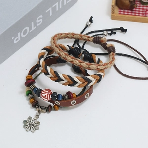 Men's bohemian handmade leather bracelet set with woven beads and metal floral charms