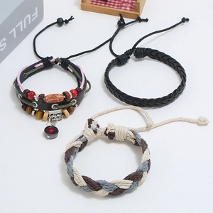 Three-piece men's leather and beaded bracelet set with braided cords and metal charms