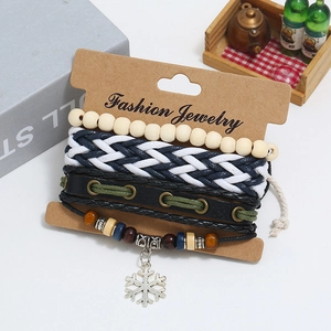 Bohemian multi-layer leather bracelet set with snowflake charm on a display card