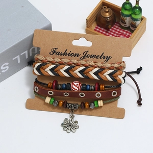 Three-piece bohemian braided leather bracelet set with wooden beads and daisy pendant