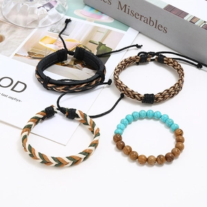 Set di 4 bracciali rétro in pelle intrecciata con perline turchesi e lacci regolabili