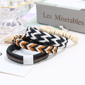 Retro wax thread woven 4-piece bracelet set with leather and beads in boho style