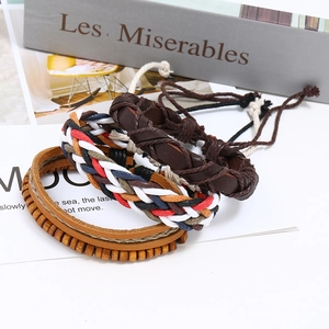Vintage braided leather bracelet set with ethnic cotton ropes and wooden beads