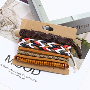 Five-piece vintage woven leather bracelet set with wooden beads on display card