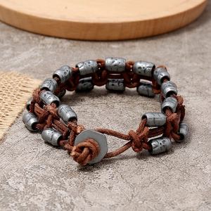 Vintage braided brown leather bracelet for men with embossed metallic beads and hexagon clasp