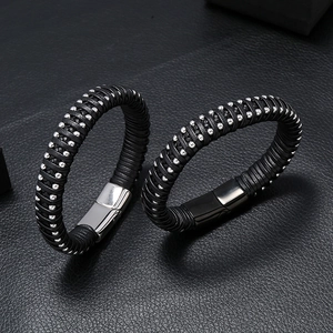 Set of two woven black leather men's bracelets with metal beads and magnetic clasps